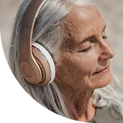 Woman relaxing to music for restful sleep